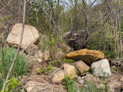 Image of large rocks stacked on each other.