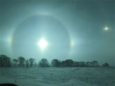 A sundog, a ring of light around the sun in the winter time. 